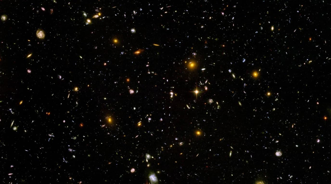 Galaxies stretching apart, pulled by an invisible accelerating force.